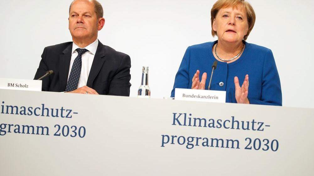 Olaf Scholz und Angela Merkel