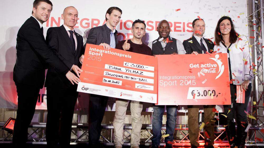 Gewinner Birol Yilmaz (Mitte) bei der Preisverleihung