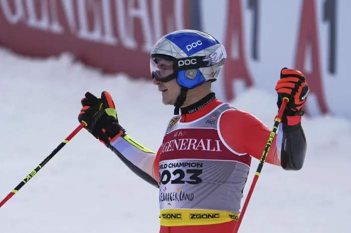 Switzerland's Marco Odermatt reacts at the finish area of a men's giant slalom, at the Alpine Ski World Championships, in Saalbach-Hinterglemm, Austria, Friday, Feb. 14, 2025. (AP Photo/Giovanni Auletta)
