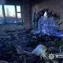 This photo provided by the Ukrainian Police Press Service shows an apartment damaged by Russian drone during air attack in Chernyhiv, Ukraine, on Christmas Eve, Wednesday, Dec. 24, 2025. (Ukrainian Police Press Service via AP)
