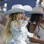 HOUSTON, TEXAS - DECEMBER 25: Beyoncé performs with daughter, Blue Ivy, during the halftime show for the game between the Baltimore Ravens and the Houston Texans at NRG Stadium on December 25, 2024 in Houston, Texas.   Alex Slitz/Getty Images/AFP (Photo by Alex Slitz / GETTY IMAGES NORTH AMERICA / Getty Images via AFP)