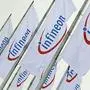 FILE - In this Feb. 12, 2009 file photo, flags with the company logo of Infineon Technologies are seen prior to the annual shareholders meeting in Munich, southern Germany. German chipmaker Infineon Technologies AG is selling a unit that makes products for wireless telephones to California's Intel Corp. in a $1.4 billion cash deal, the companies said Monday, Aug. 30, 2010. (AP Photo/Uwe Lein, File)