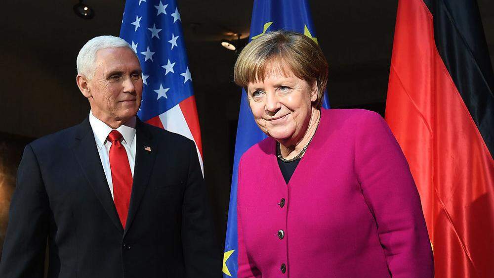 Mike Pence und Angela Merkel