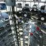 ** FILE ** A Volkswagen Passat is brought into position in one of the two delivery towers of the carmaker in Wolfsburg, northern Germany, in this March 5, 2004 file picture. Volkwagen will give their financial statement on Tuesday March 9, 2004.  (AP Photo/Fabian Bimmer) 