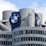 (FILES) The BMW logo is seen on the top of the headquarters of German carmaker BMW in Munich on March 20, 2018. Net profit of German company BMW fell 83.8% in the third quarter, weighed down by sales, particularly in China, on November 6, 2024. (Photo by CHRISTOF STACHE / AFP)