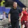 Netherlands' head coach Ronald Koeman walks at the sideline during a Group D match between Poland and the Netherlands at the Euro 2024 soccer tournament in Hamburg, Germany, Sunday, June 16, 2024. (AP Photo/Sunday Alamba)