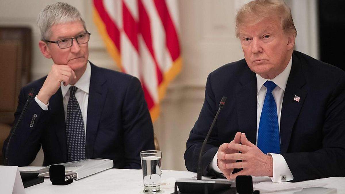 Apple-Chef Tim Cook und US-Präsident Donald Trump bei einem Treffen im März