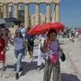 The Acropolis of Athens is shut as the worst heatwave of the season hits Greece Tourists wearing hats and carrying umbrellas for protection visit the Acropolis as the worst heatwave of the season hits Athens. The Acropolis is shut beween 12:00 and 17:00 to protect visitors and workers from the intense heat. Athens Greece Copyright: xNicolasxKoutsokostasxNicolasxKoutsokostasx DSC_202507220640
