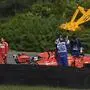 Ferrari's German driver Sebastian Vettel reacts while a crane lifts his car during the F1 Brazil Grand Prix, at the Interlagos racetrack in Sao Paulo, Brazil on November 17, 2019. (Photo by Douglas Magno / AFP)