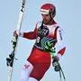 Austria’s Vincent Kriechmayr reacts in the arrival area after he crashed while competing in the men's Downhill event at the FIS Alpine Skiing World Cup in Wengen on January 18, 2025. (Photo by FABRICE COFFRINI / AFP)
