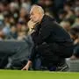 Manchester City's head coach Pep Guardiola watches his team plays from the sidelines during the English Premier League soccer match between Manchester City and West Ham United in Manchester, England, Saturday, Dec. 20, 2025. (AP Photo/Dave Thompson)