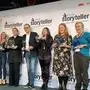 Die Weizerin Carmen Lammer (Dritte von rechts) mit den anderen Finalisten der beiden Kindle-Wettbewerbe auf der Bühne bei der Frankfurter Buchmesse