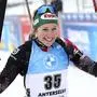 Lisa Hauser of Austria celebrates after winning the women's 15km individual race at the Biathlon World Cup in Anterselva, Italy, Thursday, Jan. 21, 2021. (AP Photo/Matthias Schrader)