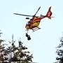 Rescuers arrive with a helicopter to evacuate France's Alexis Pinturault after he crashed during the men's Super-G event at the FIS Alpine Skiing World Cup event in Wengen on January 12, 2024. (Photo by Marco BERTORELLO / AFP)