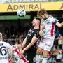 WOLFSBERG,AUSTRIA,30.MAR.24 - SOCCER - ADMIRAL Bundesliga, qualification group, Wolfsberger AC vs SCR Altach. Image shows Constantin Reiner (Altach) and Dominik Baumgartner (WAC). Photo: GEPA pictures/ Matic Klansek