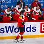 Austria’s forward #96 Marco Kasper celebrates with his teammates after the 2-0 during the IIHF Men's Ice Hockey World Championship match between Austria and Slovakia in Stockholm, on May 12, 2025. (Photo by Jonathan NACKSTRAND / AFP)