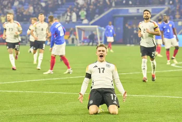 Florian Wirtz, Nr. 17 DFB scores, shoots goal , Tor, Treffer, Torschuss, 1-0, celebrates his goal, happy, laugh, celebration, in the friendly match FRANCE - GERMANY FRANKREICH - DEUTSCHLAND in preparation for European Championships 2024 on Mar 23, 2024 in Lyon, France.
