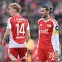 BERLIN,GERMANY,30.NOV.24 - SOCCER - 1. DFL, 1. Deutsche Bundesliga, 1. FC Union Berlin vs Bayer 04 Leverkusen. Image shows Leopold Querfeld and Christopher Trimmel (Union). Photo: GEPA pictures/ Witters/ Ottmar Winter - ATTENTION - COPYRIGHT FOR AUSTRIAN CLIENTS ONLY - DFL regulations prohibit any use of photographs as image sequences and/or quasi-video
