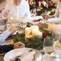 Family dining at Christmas dinner table model released Symbolfoto property released PUBLICATIONxINxGERxSUIxAUTxHUNxONLY HAPF02197  