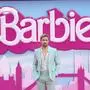 FILE - Ryan Gosling poses for photographers upon arrival at the premiere of the "Barbie" movie, July 12, 2023, in London. On Wednesday, Dec. 20, Gosling — the Ken to Margot Robbie's “Barbie” in the film — released the “I'm Just Ken” EP alongside collaborators Mark Ronson and Andrew Wyatt. (Scott Garfitt/Invision/AP, File)