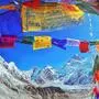 View of Mount Everest and Nuptse  with buddhist prayer flags from kala patthar in Sagarmatha National Park in the Nepal Himalaya