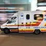 Ambulance travelling down Nathan Road, Tsim Sha Tsui, Hong Kong