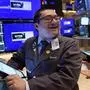 Trader Drew Cohen works on the floor of the New York Stock Exchange, Tuesday, Aug. 6, 2024.(AP Photo/Richard Drew)