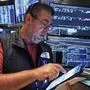 Trader Michael Capolino works on the floor of the New York Stock Exchange, Friday, June 27, 2025. (AP Photo/Richard Drew)