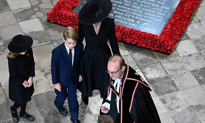 Britain's Catherine, Princess of Wales, Princess Charlotte and Prince George arrive for the State Funeral Service of Britain's Queen Elizabeth II at Westminster Abbey in London on September 19, 2022. - Leaders from around the world will attend the state funeral of Queen Elizabeth II. The country's longest-serving monarch, who died aged 96 after 70 years on the throne, will be honoured with a state funeral on Monday morning at Westminster Abbey. (Photo by Gareth Cattermole / POOL / AFP)