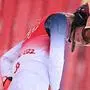 TOPSHOT - USA's Mikaela Shiffrin reacts as she did not finish the womenís alpine combined slalom event during the Beijing 2022 Winter Olympic Games at the Yanqing National Alpine Skiing Centre in Yanqing on February 17, 2022. (Photo by Fabrice COFFRINI / AFP)
