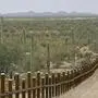 ** ADVANCE FOR SUNDAY, APRIL 29  ** The international border line made up of bollards: irregular, concrete-filled steel poles, seperating Mexico, left from the United States are shown Feb. 17, 2006 inside the Organ Pipe National Monument, Ariz.  Sixty three miles of vehicle barriers are in place on the Arizona border and authorities look to have a total of 200 miles of barriers across the Southwest, mostly in Arizona and New Mexico, by the end of 2008. (AP Photo/Matt York)