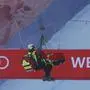 Norway's Aleksander Aamodt Kilde is lifted to the helicopter after falling during an alpine ski, men's World Cup downhill race, in Wengen, Switzerland, Saturday, Jan. 13, 2024. (AP Photo/Alessandro Trovati)