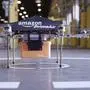 epa03974238 A undated handout image made available by Amazon on 02 December 2013, showing an octocopter drone with an Amazon logo on it, and a box attached underneath. Online retailer Amazon is testing drones to deliver packages, chief executive Jeff Bezos said 01 December 2013 but admitted it could be several years before they would be put to use. The so-called octocopter would be able to deliver packages to consumers within 30 minutes, Bezos told broadcaster CBS' programme 60 Minutes Sunday. The unmanned aerial devices would only be used for small, urgent orders to be delivered within short distances, he said. The eight-propeller drones could transport packages weighing up to 2.5 kilograms and about 16 kilometres away from a distribution centre, Bezos said. But more testing was needed, he said, as well as the approval of the US Federal Aviation Administration. And while Bezos expected to offer the service only in four to five years, he already has a name for it: Prime Air.  EPA/AMAZON / HANDOUT  HANDOUT EDITORIAL USE ONLY/NO SALES
