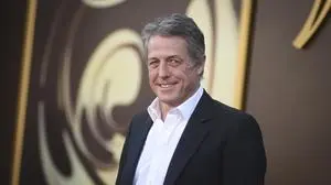 Hugh Grant arrives at the premiere of "Wonka" on Sunday, Dec. 10, 2023, at Regency Village Theatre in Westwood, Calif. (Photo by Richard Shotwell/Invision/AP)