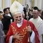 FILE - Cardinal Matteo Zuppi, head of the CEI (Italian Conference of Bishops), welcomes parishioners after celebrating Mass at the Cathedral of the Immaculate Conception in Moscow, on June 29, 2023. (AP Photo/Alexander Zemlianichenko, File)
