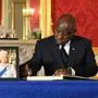 South African President Cyril Ramaphosa signs a book of condolence at Lancaster House in London on September 18, 2022 following the death of Queen Elizabeth II on September 8. - Britain was gearing up Sunday for the momentous state funeral of Queen Elizabeth II as King Charles III prepared to host world leaders and as mourners queued for the final 24 hours left to view her coffin, lying in state in Westminster Hall at the Palace of Westminster. (Photo by Jonathan HORDLE / POOL / AFP)