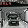 (FILES) An electric vehicle of the model Y is pictured during the start of the production at Tesla's "Gigafactory" on March 22, 2022 in Gruenheide, southeast of Berlin. Electric car manufacturer Tesla has announced it is suspending for two weeks the bulk of production at its factory in Germany, citing a shortage of parts due to shipping delays caused by Huthi rebel attacks in the Red Sea. The Tesla factory outside Berlin opened in 2022 and employs around 11,500 people, turning out about 250,000 vehicles a year, according to the company, which plans to expand the facility to double production. (Photo by Patrick Pleul / POOL / AFP)