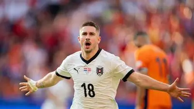 ABD0193_20240625 - BERLIN - DEUTSCHLAND: Romano Schmid (AUT) jubelt bei seinem Tor zum 1:2 am Dienstag, 25. Juni 2024, anl. des UEFA EURO 2024-Spiels (Gruppe D/3. Runde) zwischen Niederlande und Österreich im Olympiastadion in Berlin. - FOTO: APA/GEORG HOCHMUTH