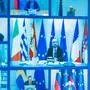This photo of a television screen taken and handout by the press office of Palazzo Chigi on March 26, 2020 shows Italian Prime Minister, Giuseppe Conte (Bottom R), European Council President Charles Michel (C), German Chancellor Angela Merkel (R) and other world leaders taking part in a video conference as part of an extraordinary meeting of G20 leaders, from the Chigi Palace in Rome, during the country's lockdown following the COVID-19 new coronavirus pandemic. - Italian Prime Minister Giuseppe Conte is blocking a joint response that EU leaders are trying to put together to the coronavirus crisis, an Italian government source said on March 26. (Photo by Handout / Palazzo Chigi press office / AFP) / RESTRICTED TO EDITORIAL USE - MANDATORY CREDIT "AFP PHOTO / PALAZZO CHIGI PRESS OFFICE" - NO MARKETING - NO ADVERTISING CAMPAIGNS - DISTRIBUTED AS A SERVICE TO CLIENTS
