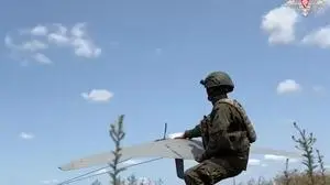 FILE - In this photo taken from video distributed by Russian Defense Ministry Press Service on July 17, 2025, a Russian serviceman operates a "Supercam" drone in an undisclosed location in Ukraine. (Russian Defense Ministry Press Service via AP, File)