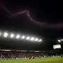 A lightning is seen in the sky during the FIFA Club World Cup 2025 Group H football match between Mexico's Pachuca and Austria's FC Salzburg at the TQL stadium in Cincinnati on June 18, 2025. (Photo by Paul ELLIS / AFP)