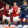 Scotland's midfielder Stuart Armstrong (R) vies with Austria's midfielder Xaver Schlager (L) during the FIFA World Cup Qatar 2022 qualification football match between Scotland and Austria at Hampden Park in Glasgow on March 25, 2021. (Photo by ANDY BUCHANAN / AFP)