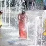 Kinder bei Brunnen