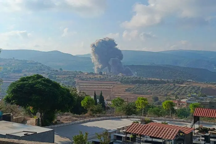 Smoke billows from the site of an Israeli airstrike on Zibqin in southern Lebanon on August 25, 2024, amid escalations in the ongoing cross-border tensions as fighting continues between Israel and Hamas militants in the Gaza Strip. Hezbollah said early on August 25 it had launched more than 320 rockets at Israel overnight, targeting a string of military positions, even as Israel's military said it was carrying out pre-emptive strikes against the group. (Photo by Kawnat HAJU / AFP)