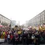 Participants hold up placards during a demonstration against racism and far-right politics in Munich, southern Germany on January 21, 2024. Tens of thousands of people were expected to turn out again on January 21 to protest against the far-right AfD, after it emerged that party members discussed mass deportation plans at a meeting of extremists. (Photo by MICHAELA STACHE / AFP)