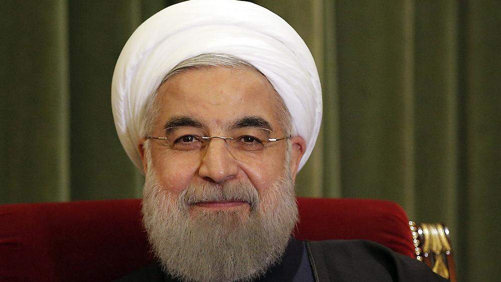 Zufrieden. Präsident Hassan Rouhani