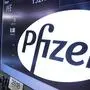 The Pfizer logo appears above a trading post on the floor of the New York Stock Exchange, Monday, Nov. 23, 2015. Pfizer and Allergan are joining in the biggest buyout of the year, a $160 billion stock deal that will create the world's largest drugmaker. (AP Photo/Richard Drew)