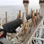 (FILES) In this file photo taken on November 15, 2018 an employee of the Allseas offshore service company works on the ship "Audacia", from where parts of the Nord Stream 2 pipeline are laid in the Baltic Sea off the coast of Laage, northeastern Germany. - Germany accused the US of interfering in its internal affairs on December 21, 2019 for imposing sanctions on companies working on a major project to supply Western Europe with Russian gas. Swiss contractor Allseas said after the sanctions were imposed that it had "suspended its Nord Stream 2 pipelay activities". (Photo by Bernd Wüstneck / dpa / AFP) / Germany OUT