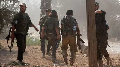 Kämpfer der ehemaligen Al-Nusra-Front im Süden der Stadt