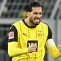 Dortmund's German midfielder #23 Emre Can celebrates after the 1-1 goal during the German first division Bundesliga football match BVB Borussia Dortmund vs RB Leipzig in Dortmund, western Germany on November 2, 2024. (Photo by INA FASSBENDER / AFP) / DFL REGULATIONS PROHIBIT ANY USE OF PHOTOGRAPHS AS IMAGE SEQUENCES AND/OR QUASI-VIDEO